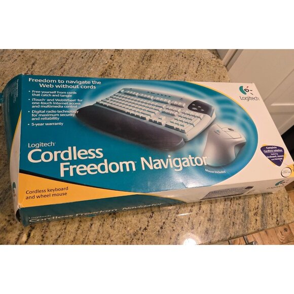 Logitech Cordless Freedom Navigator Keyboard Wheel Mouse Receiver User Guide - Picture 1 of 12